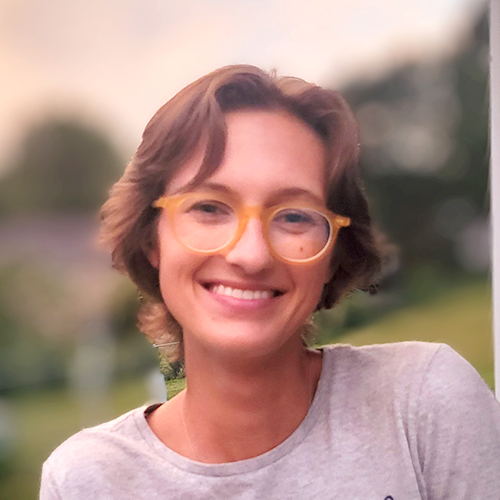 Betsey Hubbard facing front and smiling.