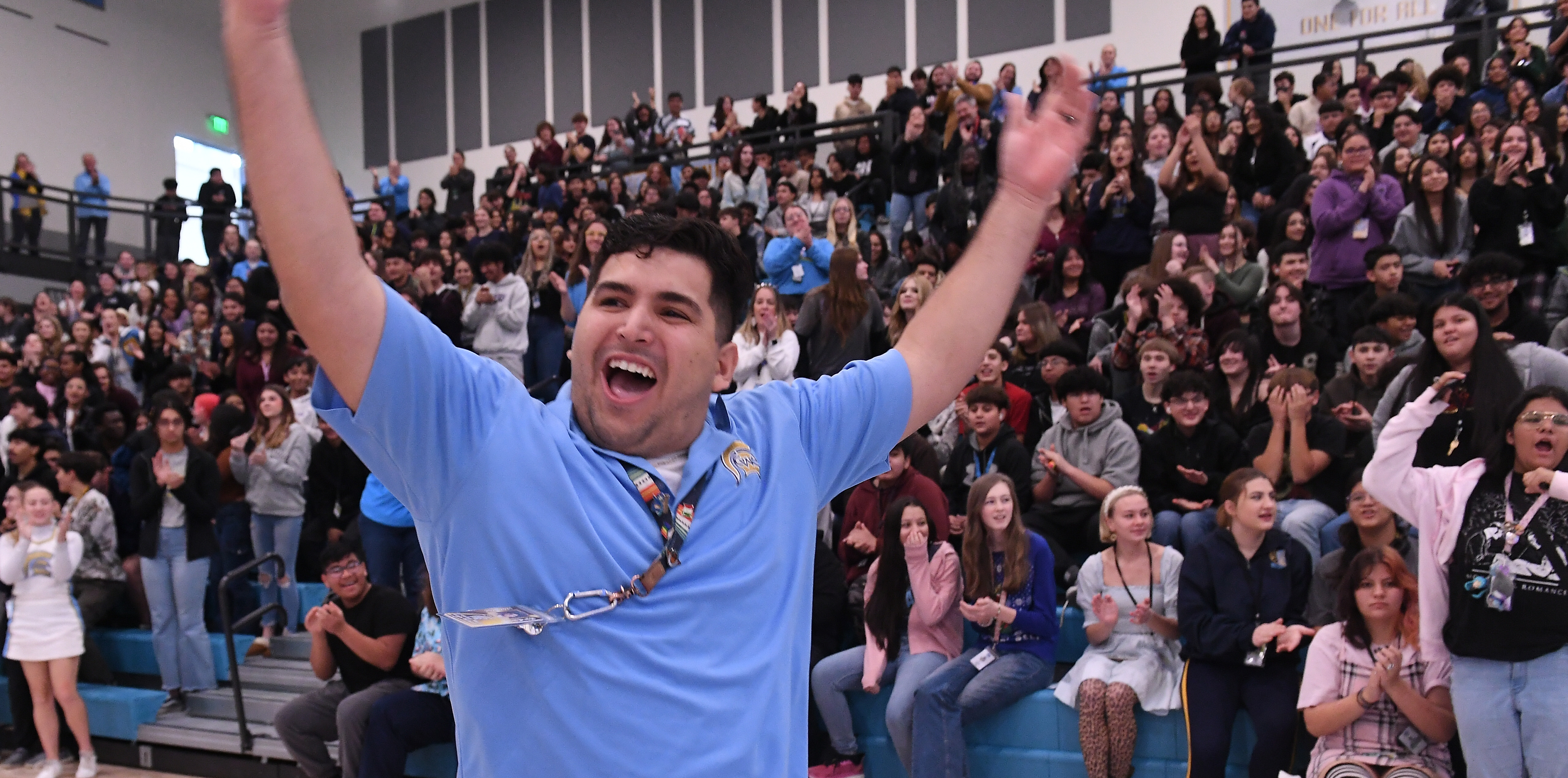 Caleb Flores throwing his hands up in celebration