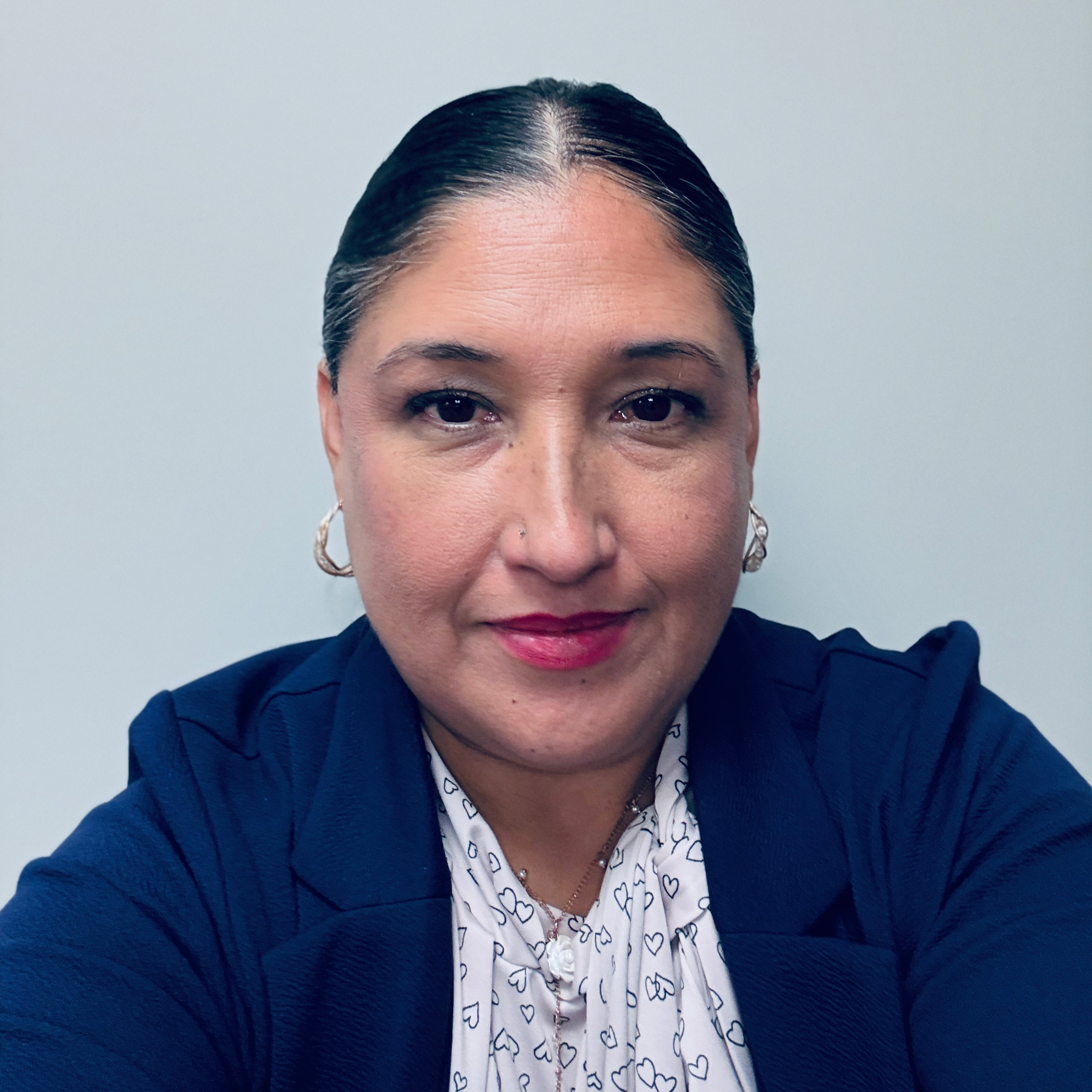 A headshot of Claudia Hernandez