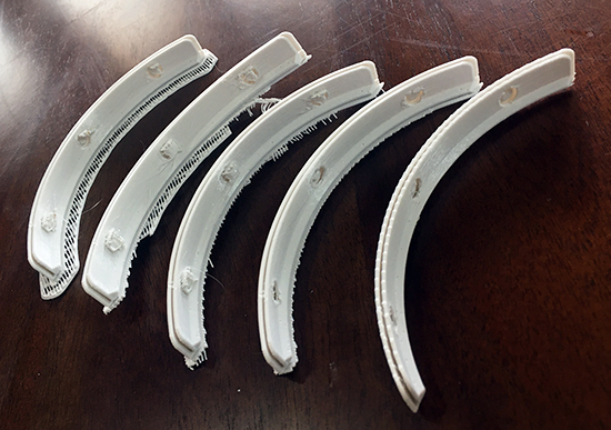Numerous parts printed to be assembled as part of the face shields