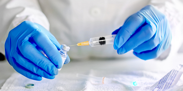 Stock image of researcher preparing vaccination