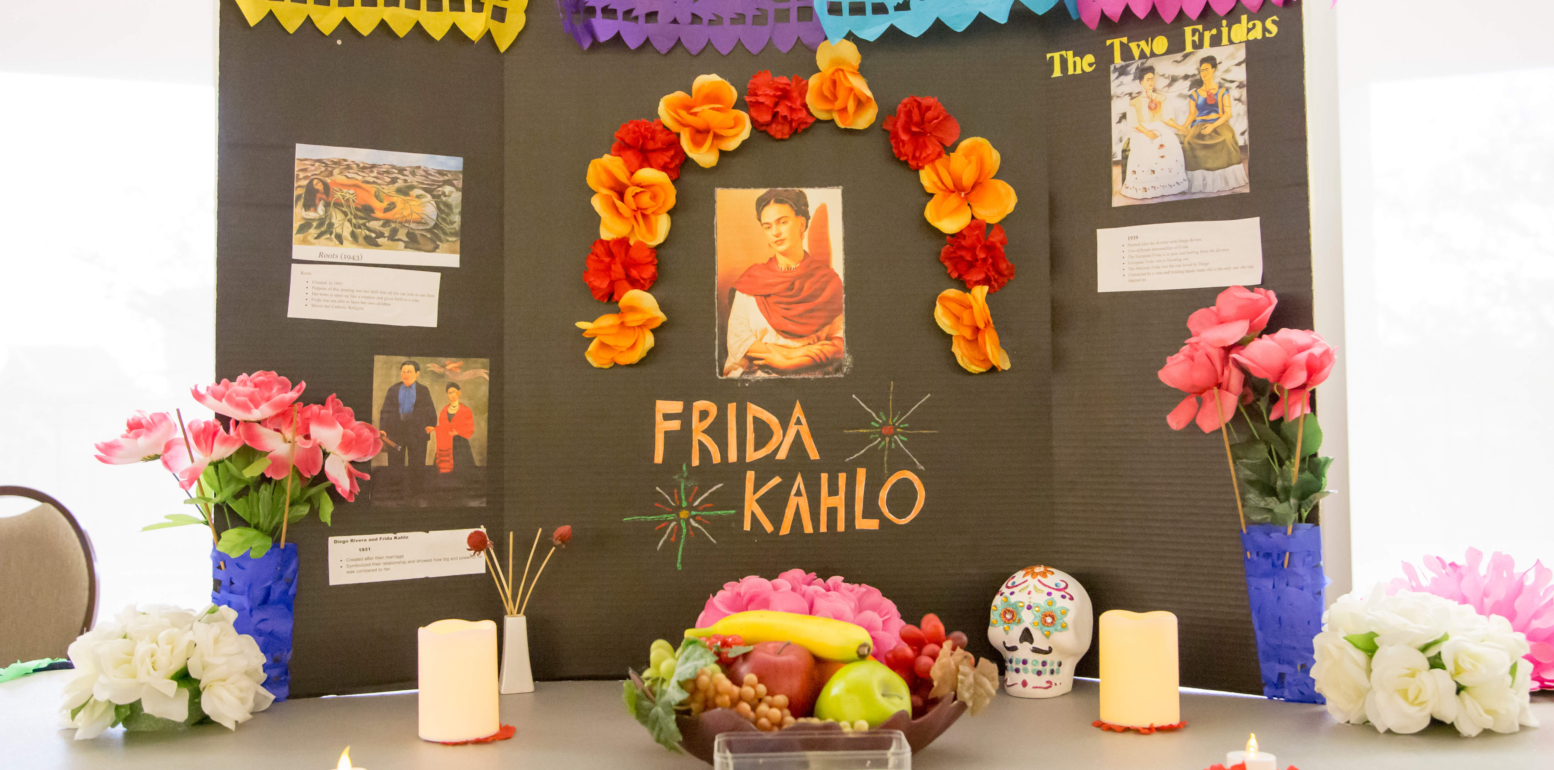 Colorful altar depitcing photos of Frida Kahlo