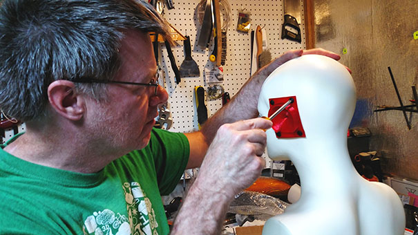 Don Finan attached 3d ear to mannequin