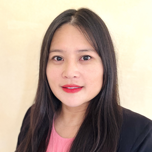 Guofeng Shen facing forward and smiling