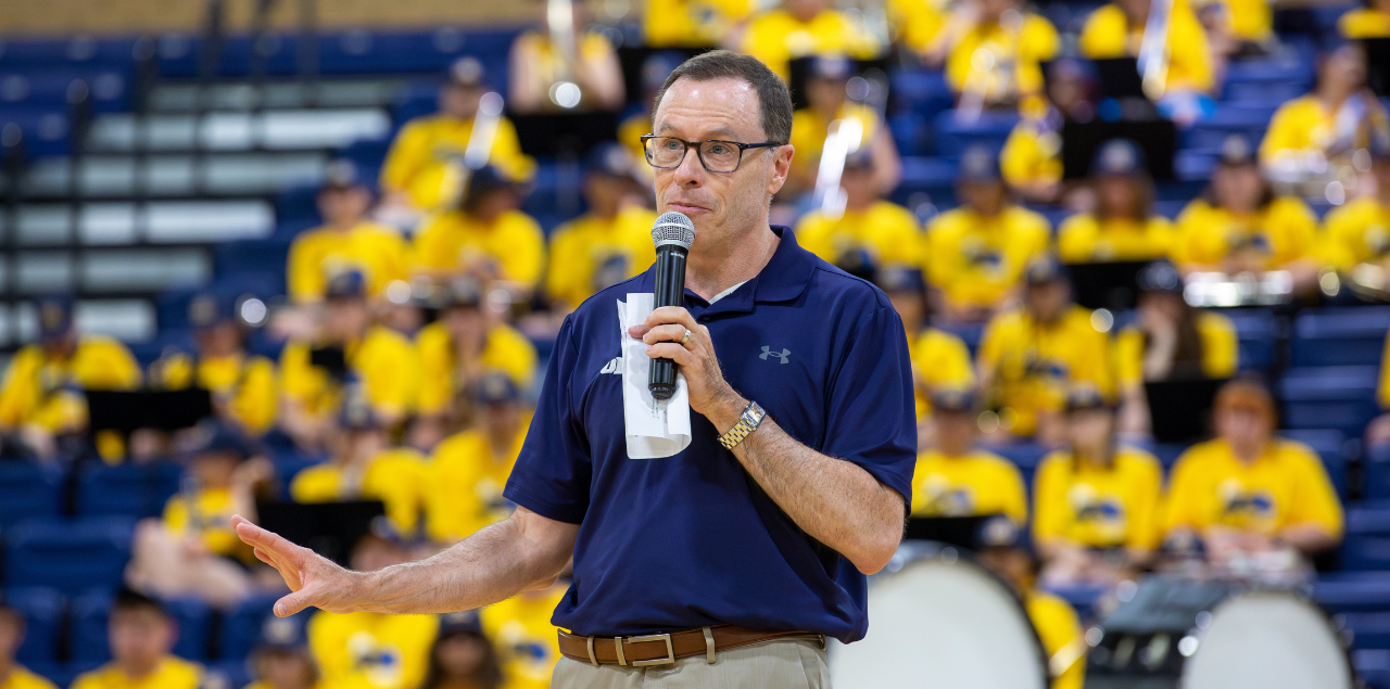 VP of Student Affairs Keith Humphrey speaking into a microphone