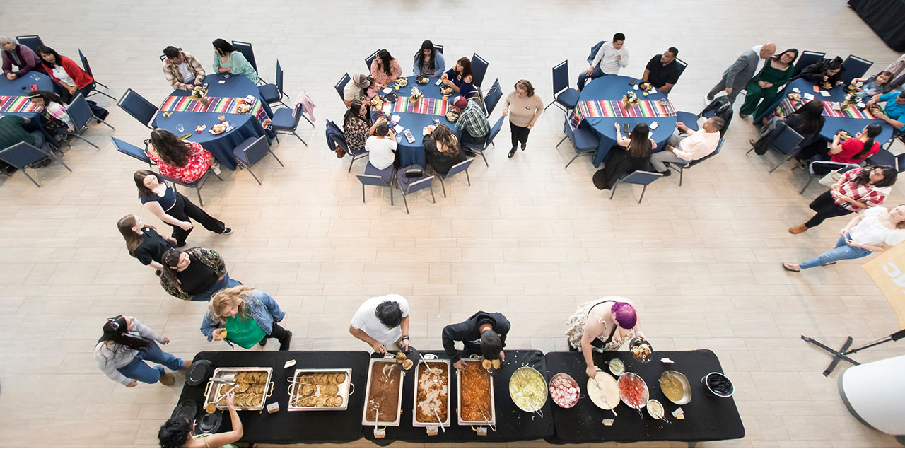 Cenit shot of a table with food and other tables with people