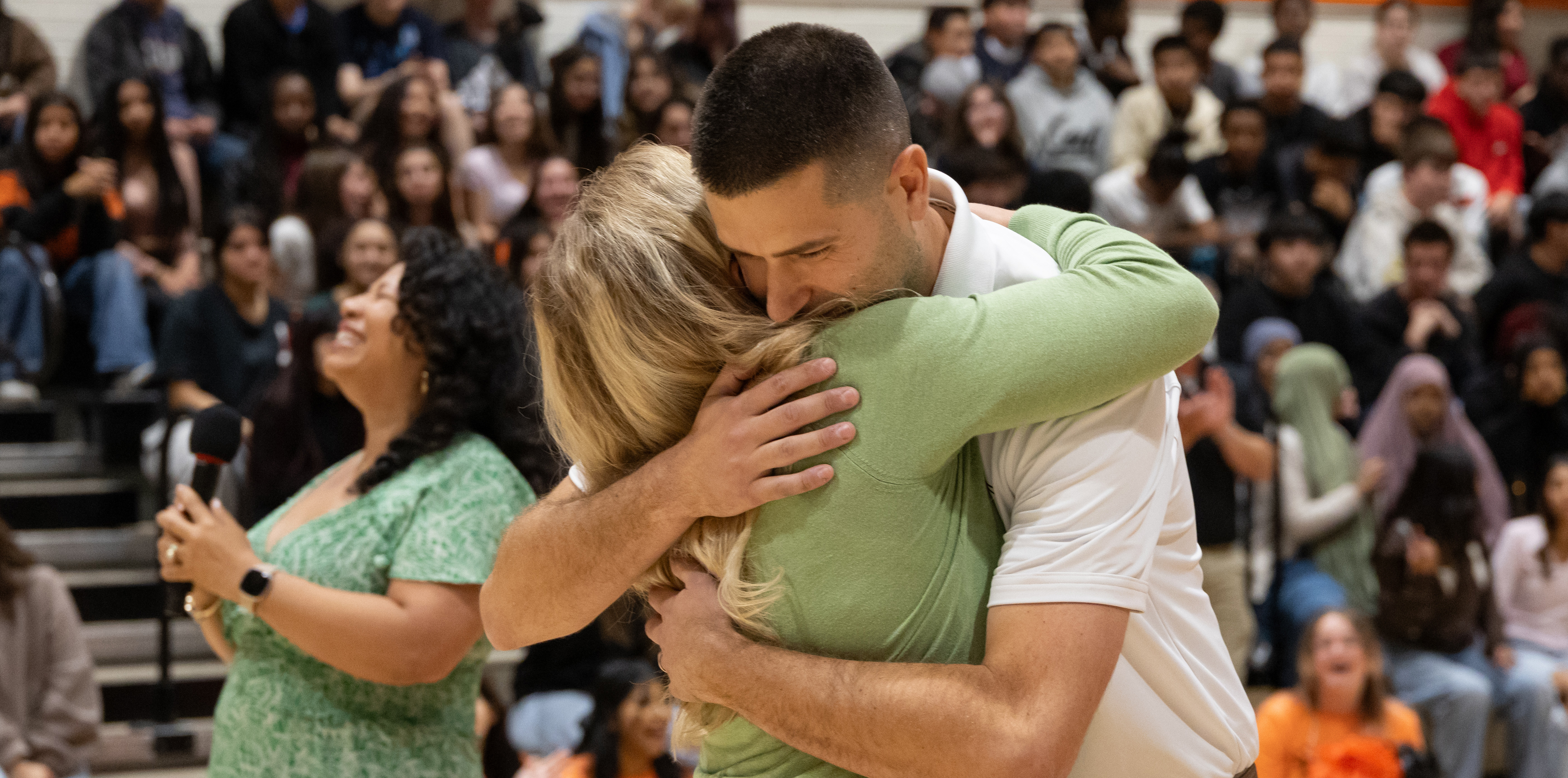Stephen Paulson hugging his wife