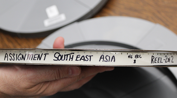 Side view of the "Assignment - Southeast Asia" film reel