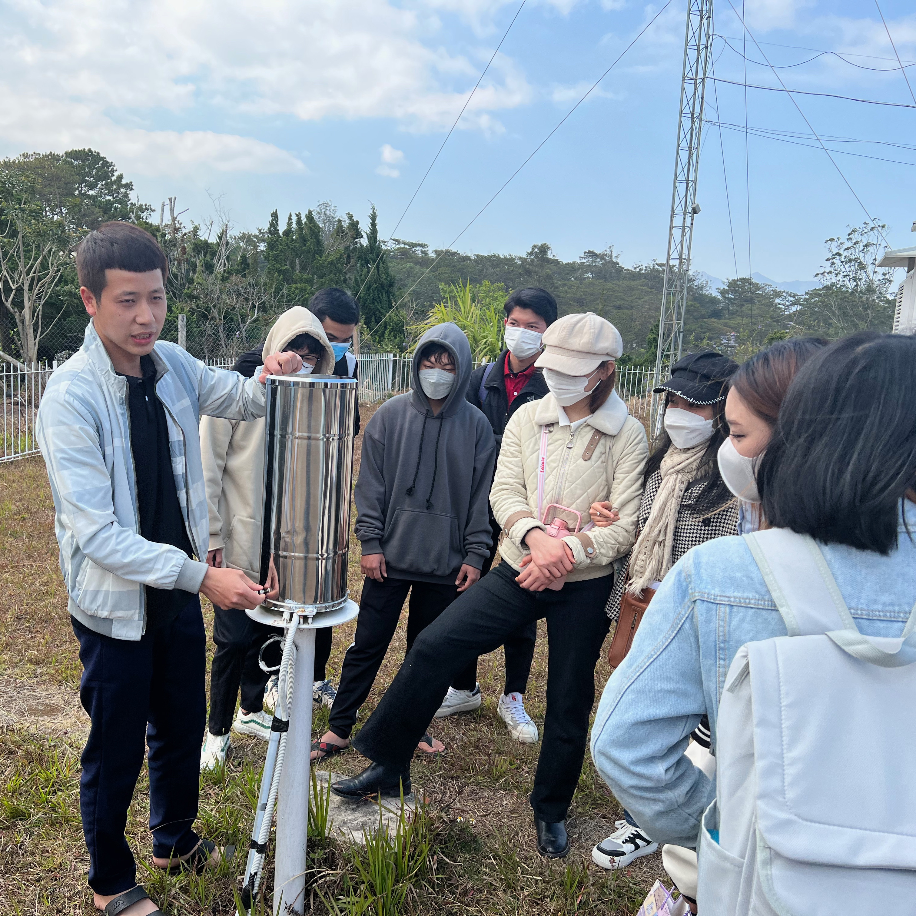 University of Dalat students touring the local government weather station.