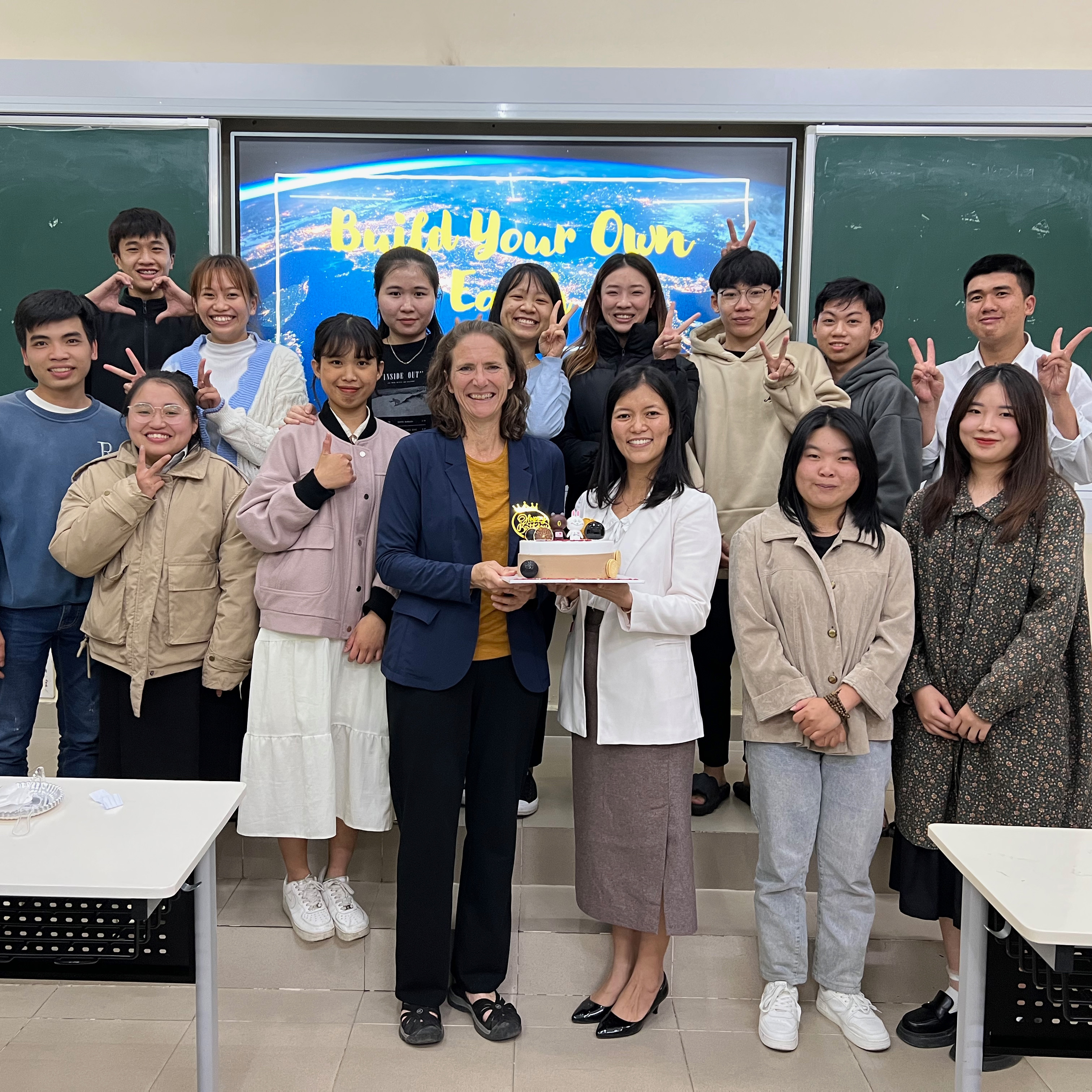 Cindy Shellito posing with her University of Dalat students on the last day of the course.