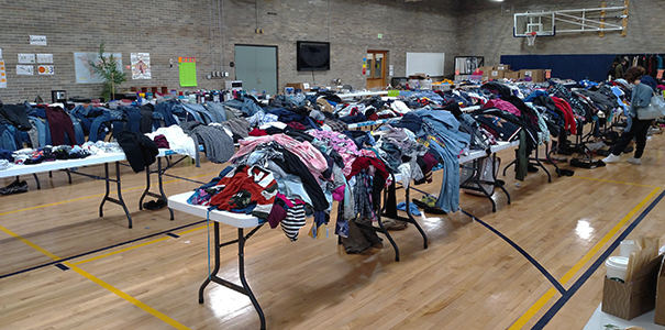 Clothes on tables at past CSC Yard Sale