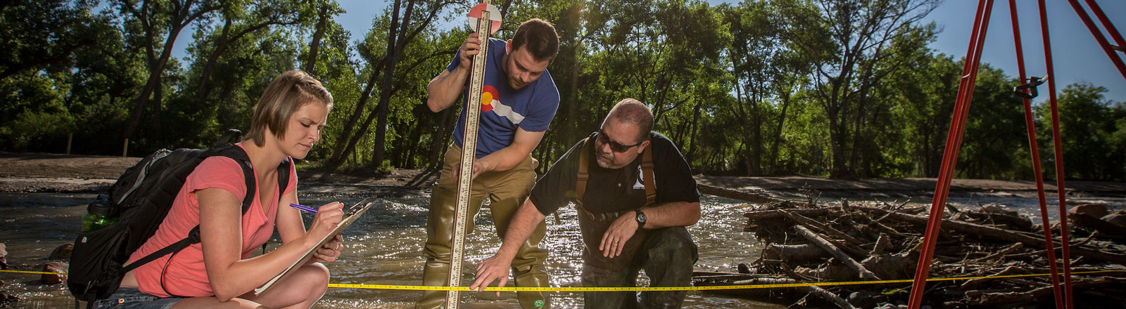 Scientists out in the field completing river research in Colorado